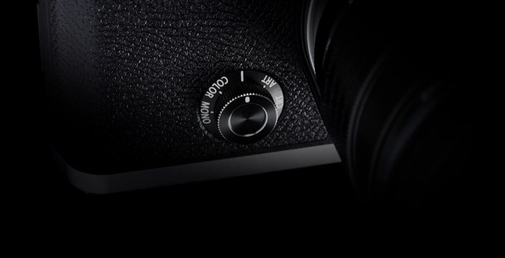 OM System camera front dial teaser.