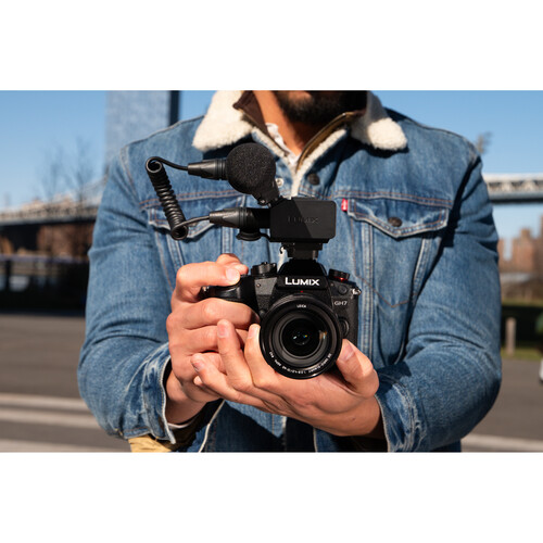 A person holding a Lumix GH7 camera