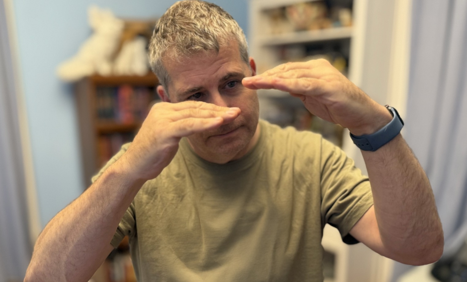 The author holds his hands apart to gesture a small change. 