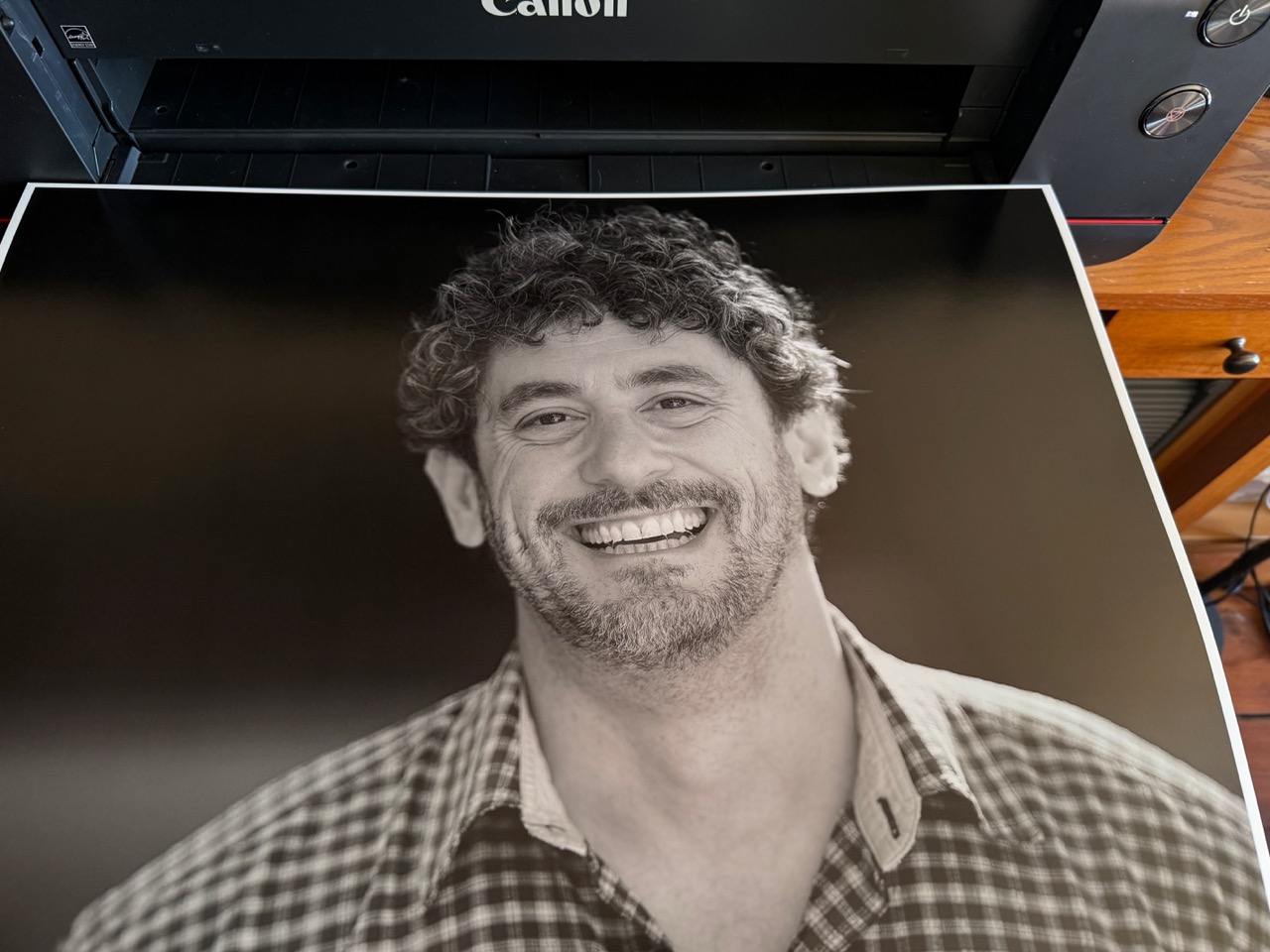 A portrait of a man in monochrome from the Canon printer. 