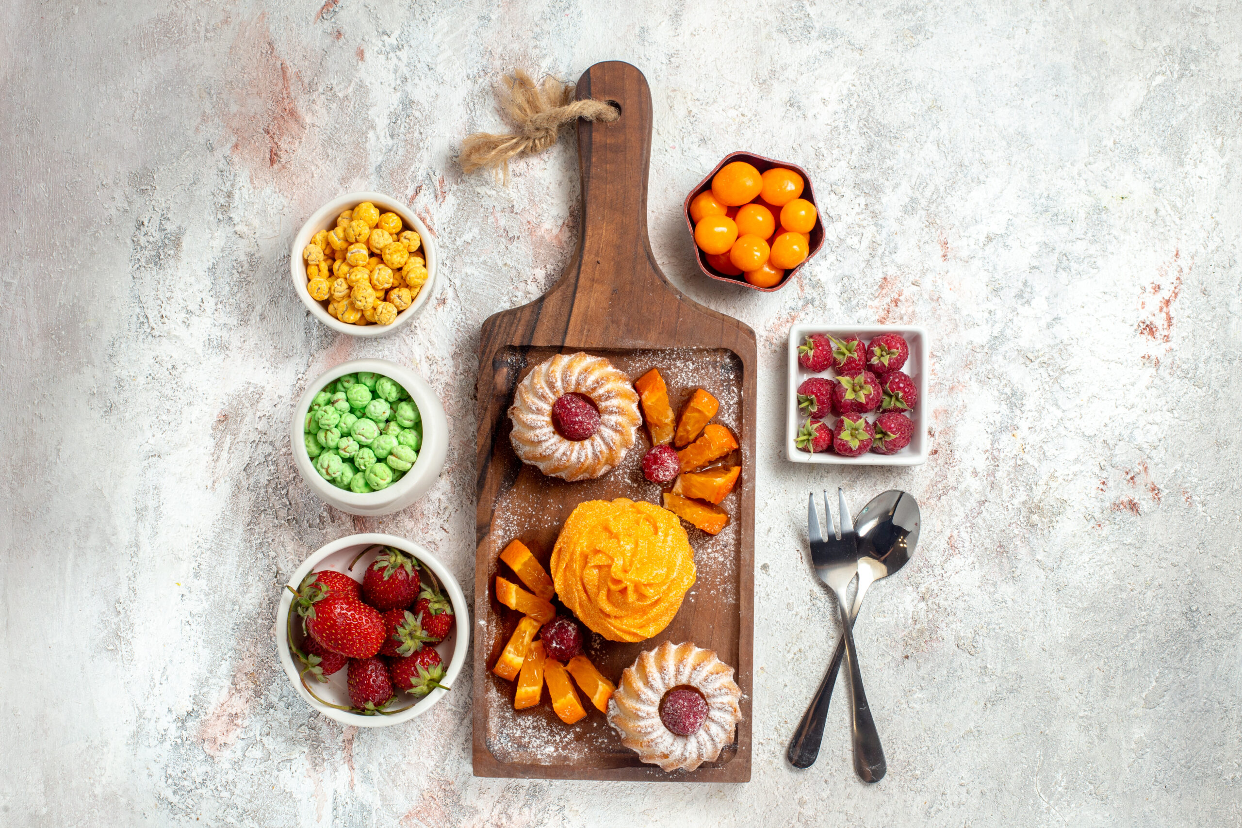 f pastries and fruit photographed from above. 