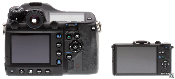 Since we have them both in-house, we thought we'd compare one of the largest SLRs to