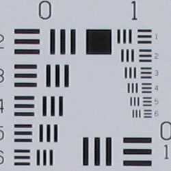Wide: sharper at center.