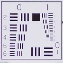 Tele: Sharper at center.