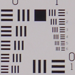 Tele: Sharper at center.
