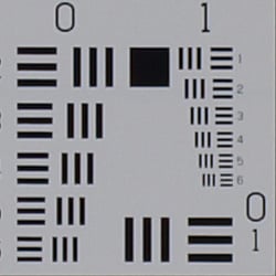 Tele: Sharp at center.