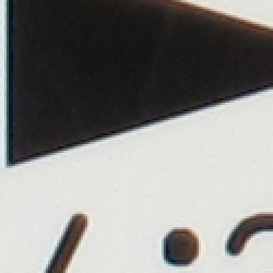 Tele: Very little, top left @ 200%