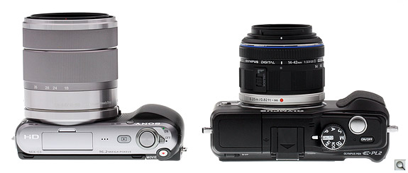 The Olympus E-PL2 has a physical mode dial and a power button, rather than a switch.