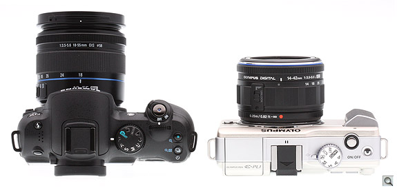 The E-PL1 is shorter front-to-back, thanks to the collapsible kit lens, but that's also a bit