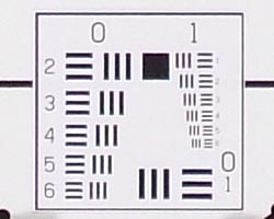 Tele: sharp at center.