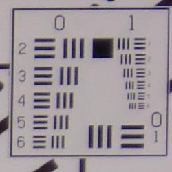 Tele: slightly soft at upper right.