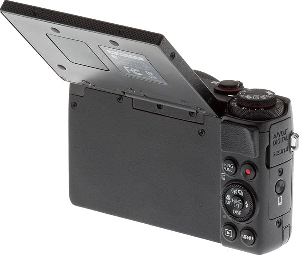Canon G7 X review -- 3/4 rear view with LCD up