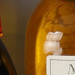 100% crop from Canon SL2 test image taken at ISO 100