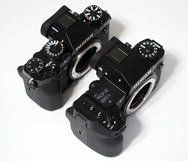 The Fujifilm X-H2 sitting in front of the X-T5.