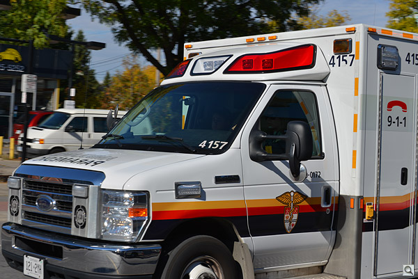 I heard the ambulance before I saw it, and barely had time to raise the camera