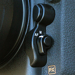 The D800's Focus Mode selector with central AF-mode button is similar to that from the D7000.