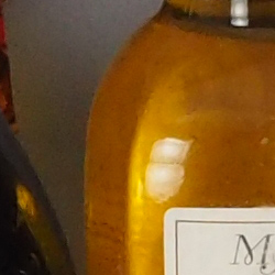 100% crop from Olympus E-M10 II test image taken at ISO 1600