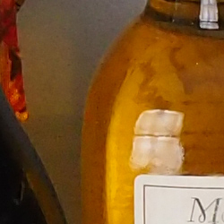 100% crop from Olympus E-PL9 test image taken at ISO 1600