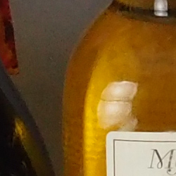 100% crop from Olympus E-PL5 test image taken at ISO 1600