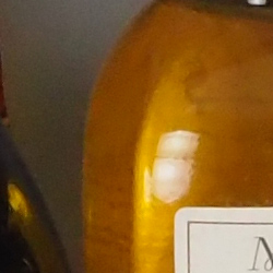 100% crop from Olympus PEN-F test image taken at ISO 1600