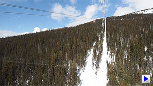 Riding the Peak-to-Peak gondola from Whistler to Blackcomb mountain while my comrades chat about other similarly
