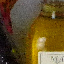 100% crop from Panasonic LX7 test image taken at ISO 3200