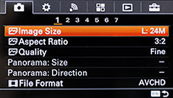 Out with the new, in with the old. The icon-based main menu of the NEX-6 (right)